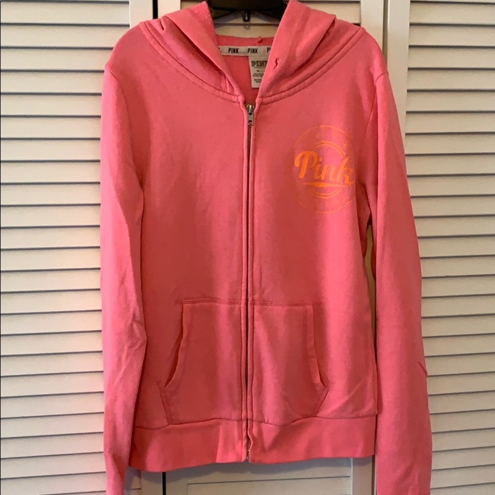 Pink sweater.